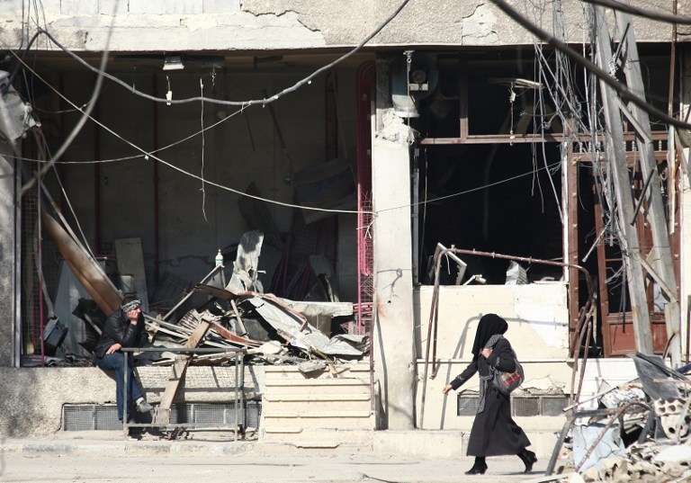 Une rue d'Arbeen, banlieue rebelle de Damas, le 17 décembre 2014 Une rue d'Arbeen, banlieue rebelle de Damas, le 17 décembre 2014