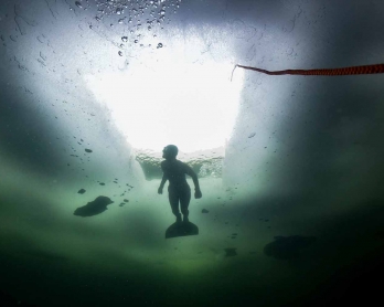 Johanna Nordblad, 42, Finnish freediver swims under ice during a Ice-freediving training session on February 28, 2017, in a green lake in Somero (southwest Finland).