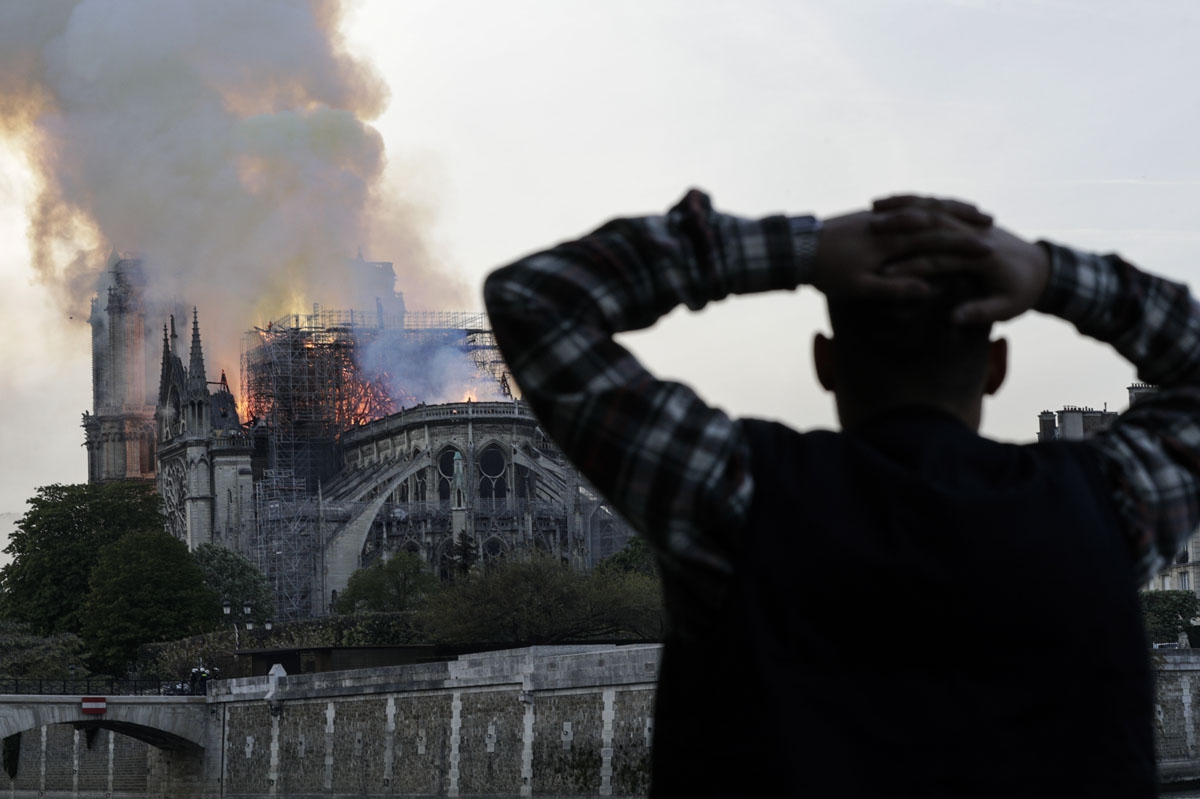 https://making-of.afp.com/sites/default/files/styles/list_xl/public/medias/aa_new_posts/countries/france/arts-culture/notre-dame-april2019/france-notredame-fire-004.jpg?itok=Y_zG67dm